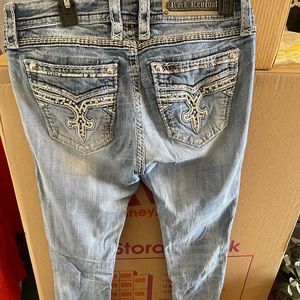 Rock revival skinny straight leg jeans with embellished pockets.  Size 30.
